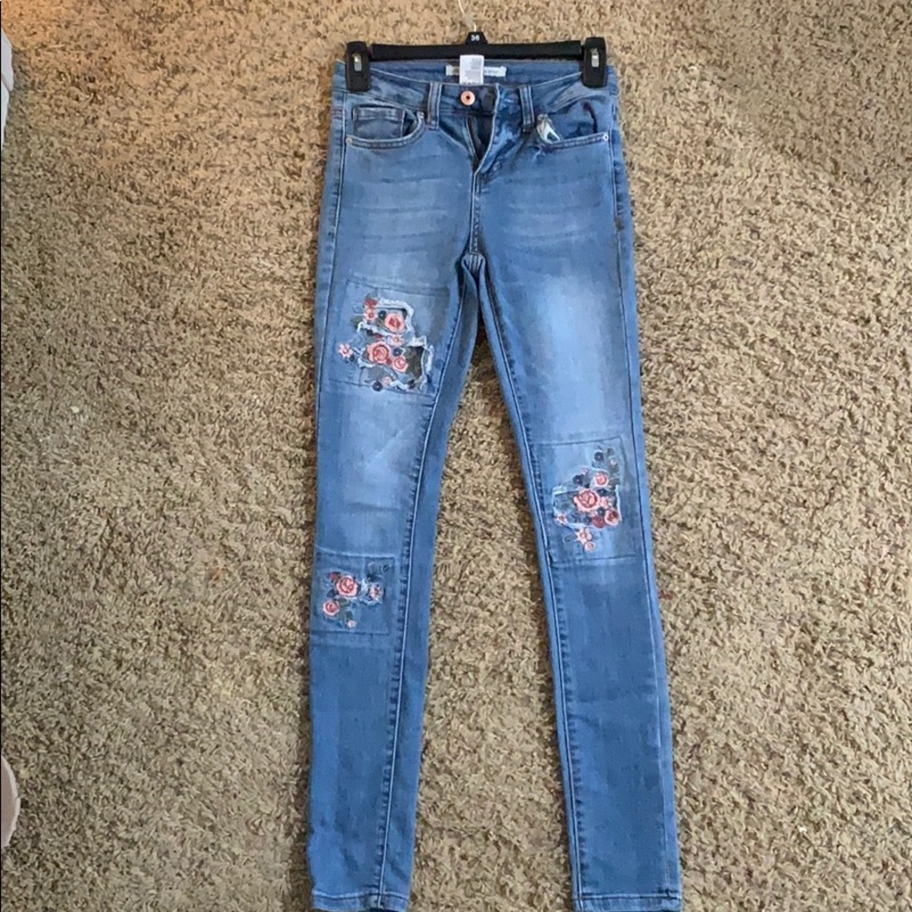 American rag jeans with embroidered with flowers
